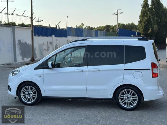 Acil OTOMOBİL RUHSATLI MÜKEMMEL TEMİZLİKTE COURİER