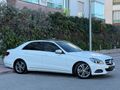 2013 MERCEDES E 180 ELİT HATASIZ BOYASIZ SADECE 180 BİN KM