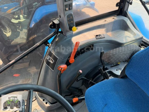DEVTRAK'TAN NEW HOLLAND TL 100 A 2008 MODEL 5500 SAATTE
