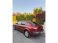 2004 Model   1.6 dinamik 223KM de masrafsız  gerçek kırmızı 