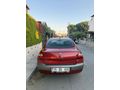 2004 Model   1.6 dinamik 223KM de masrafsız  gerçek kırmızı 