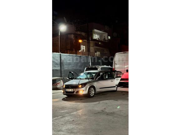 Sahibinden Opel Astra 1.6 twinport Model 2005 bu paraya klimalı donanımlı başka araç yok depo kapağı kilitli özliği bile mevcut