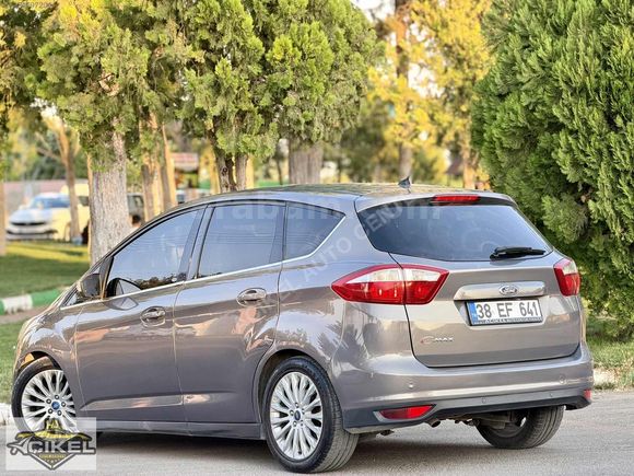 AÇIKEL AUTO CENTER-CAM TAVAN-TİTANYUMX-230.000KM