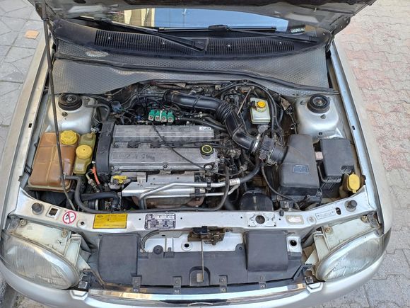 Klimalı, hidrolik direksiyonlu, orjinal Ford Escort