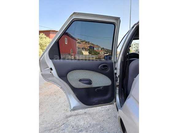 Klimalı, hidrolik direksiyonlu, orjinal Ford Escort