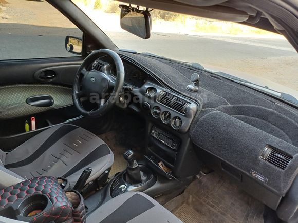 Klimalı, hidrolik direksiyonlu, orjinal Ford Escort