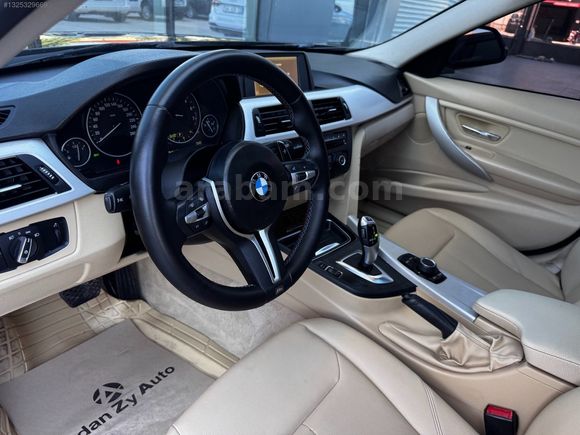 ADANZY AUTO'dan 2014M BMW 320İ İÇİ BEJ M DİREKSİYON