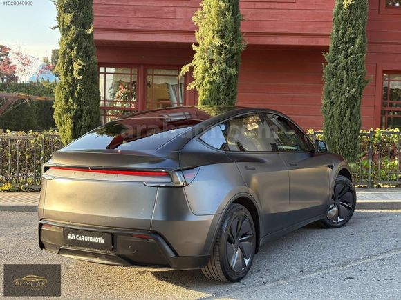 BUY CAR'DAN 2025 TESLA Model Y RWD JuniperHATASIZ K.K 12 TAKSİT