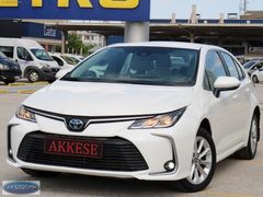 2022 COROLLA 1.8 HYBRİD ÖZEL ÜRETİM İÇİ BEJ SERVİS BAKIMLI BEYAZ