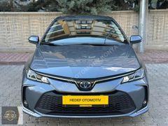 2023 TOYOTA COROLLA 1.8 HYBRİD DREAM 140 HP HATASIZ 99.000 KM'DE
