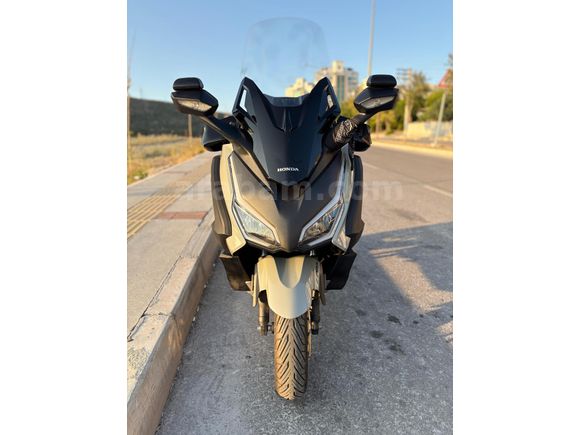 gırtlak dolusu Honda Forza 250