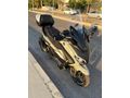 gırtlak dolusu Honda Forza 250