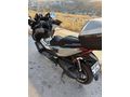 gırtlak dolusu Honda Forza 250