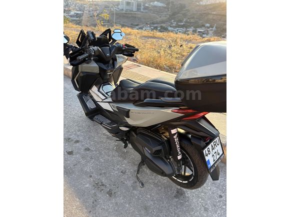 gırtlak dolusu Honda Forza 250