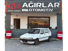 AĞIRLAR OTOMOTİV FİAT UNO 1999 MODEL 70'LİK S 12 TAKSİT