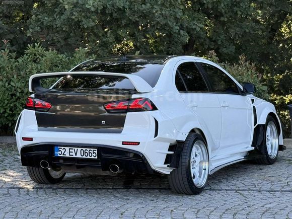 2009 MODEL LANCER 2.0 EVO MR TC -SST MODELİDİR