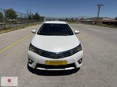 COROLLA 1.6 TOUCH 132 BG İLK SAHİBİNDEN ALDIM 116 BİN KM İÇİ BEJ