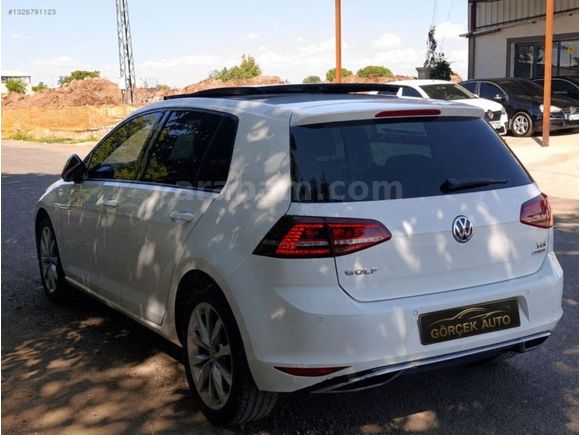 GÖRÇEKTEN,, golf iç bej sanruflu