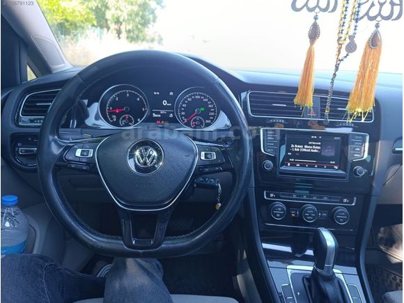 GÖRÇEKTEN,, golf iç bej sanruflu