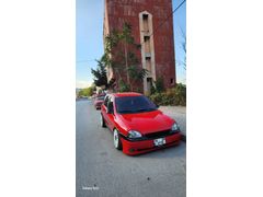 Sahibinden Opel Corsa 1.2 swing 2000 Model  170.000 km Kırmızı