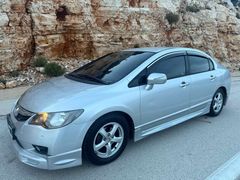 Sahibinden Honda Civic 1.4 motor hibrit.2009 Model  65.000 km Gri (Gümüş)