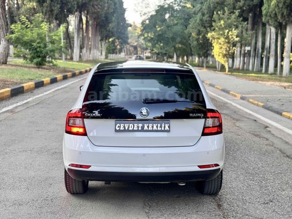 CEVDET KEKLIK’TEN SKODA RAPİD CAM TAVAN