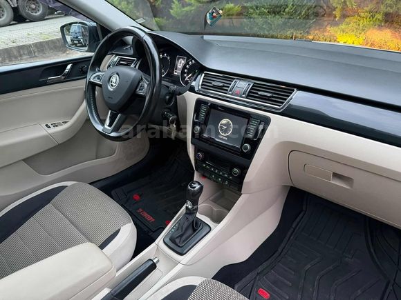 2015 MODEL İLK SAHİBİNDEN HATASIZ RAPİD CAM TAVAN ,İÇİ BEJ