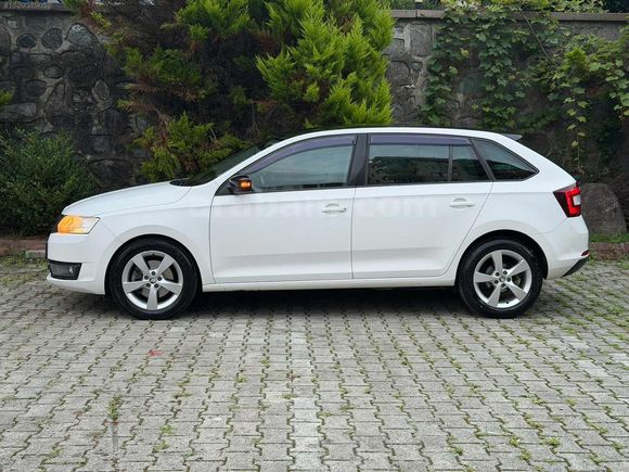 2015 MODEL İLK SAHİBİNDEN HATASIZ RAPİD CAM TAVAN ,İÇİ BEJ
