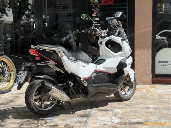 MOTOMAS' tan ADX 125