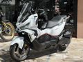 MOTOMAS' tan ADX 125