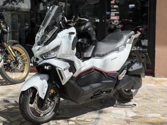 MOTOMAS' tan ADX 125