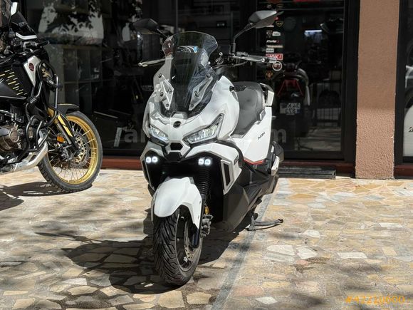 MOTOMAS' tan ADX 125