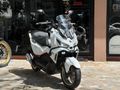 MOTOMAS' tan ADX 125