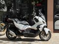 MOTOMAS' tan ADX 125