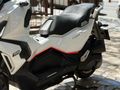 MOTOMAS' tan ADX 125