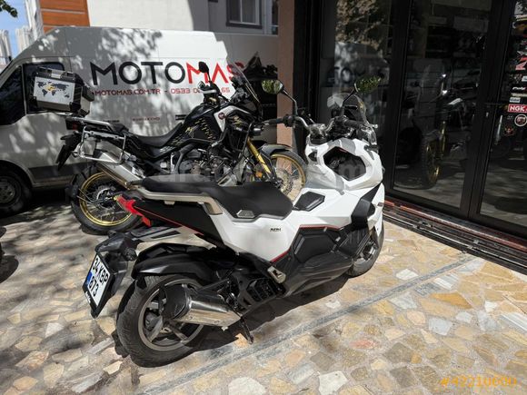 MOTOMAS' tan ADX 125