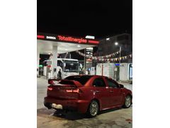 Sahibinden Mitsubishi Lancer 1.5 Inform 2009 Model  235.000 km Kırmızı