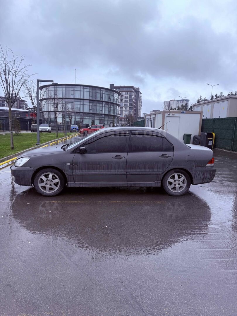 Sahibinden Mitsubishi Lancer 1.6 Invite 2006 Model İstanbul 323.000 km Füme 1