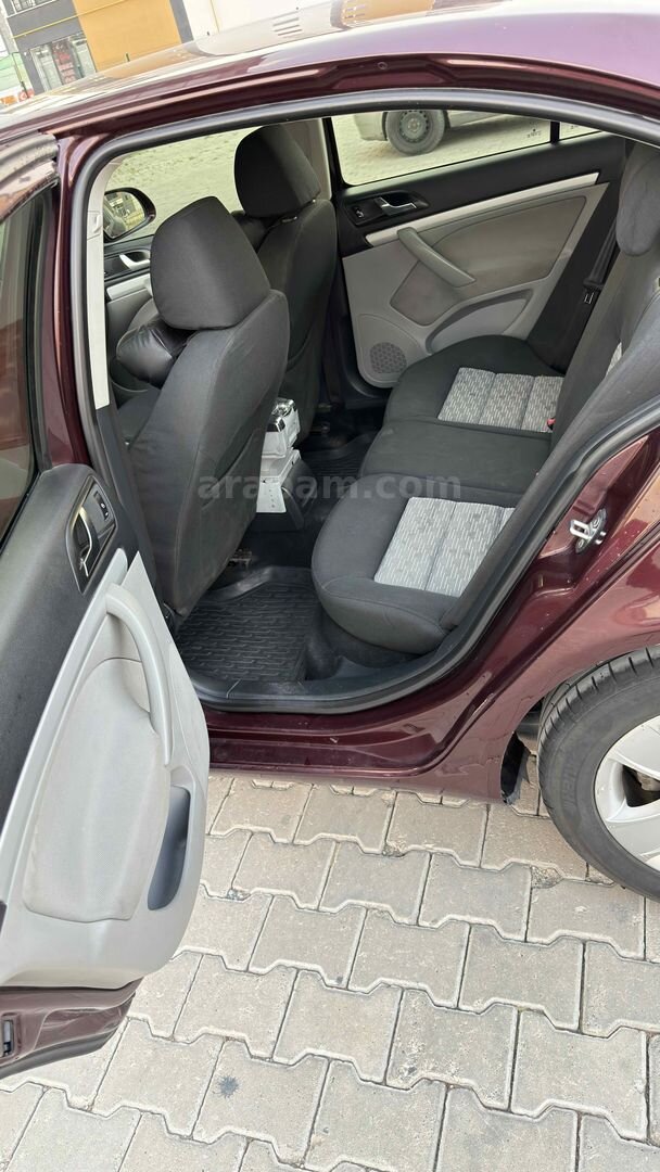 Sahibinden Skoda Octavia 1.6 TDI Ambiente 2011 Model Kayseri 310.000 km Bordo 7