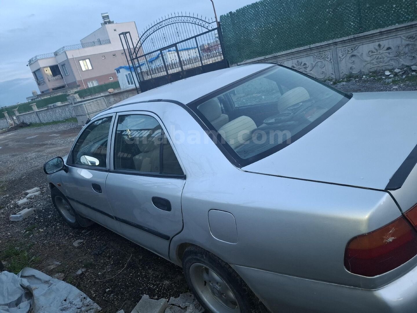 Sahibinden Mitsubishi Carisma 1.6 GLX 1999 Model Adıyaman 405.000 km Gri (Gümüş) 4