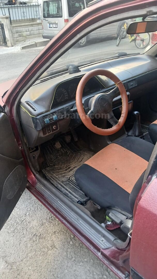 Sahibinden Mazda 323 1.5 Familia 1994 Model Ankara 350.000 km Bordo 5
