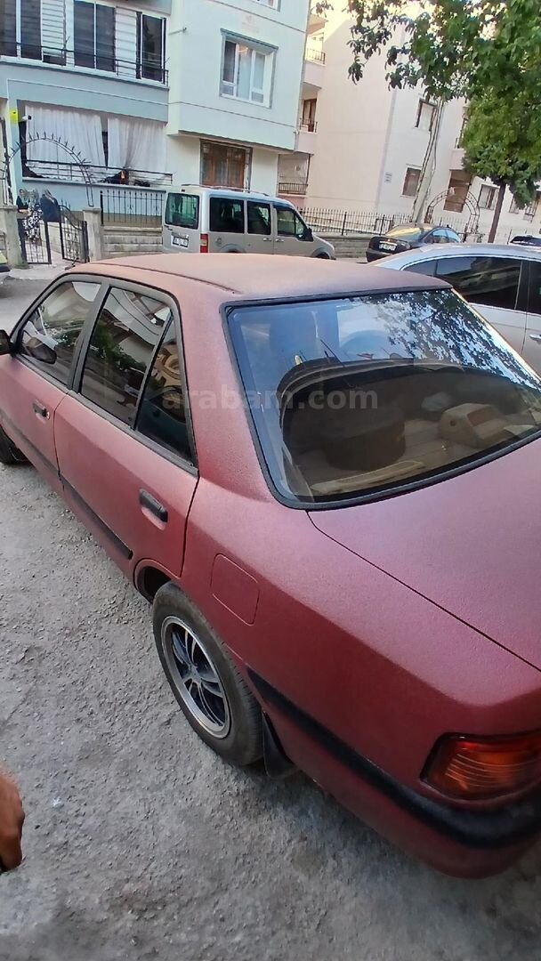Sahibinden Mazda 323 1.5 Familia 1994 Model Ankara 350.000 km Bordo 2