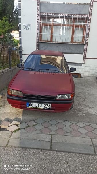 Sahibinden Mazda 323 1.5 Familia 1994 Model Ankara 350.000 km Bordo