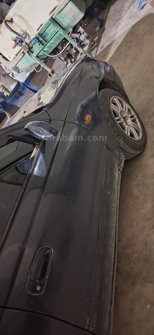 Sahibinden Toyota Carina 2.0 GLi 1997 Model Mersin 444.000 km Siyah 4