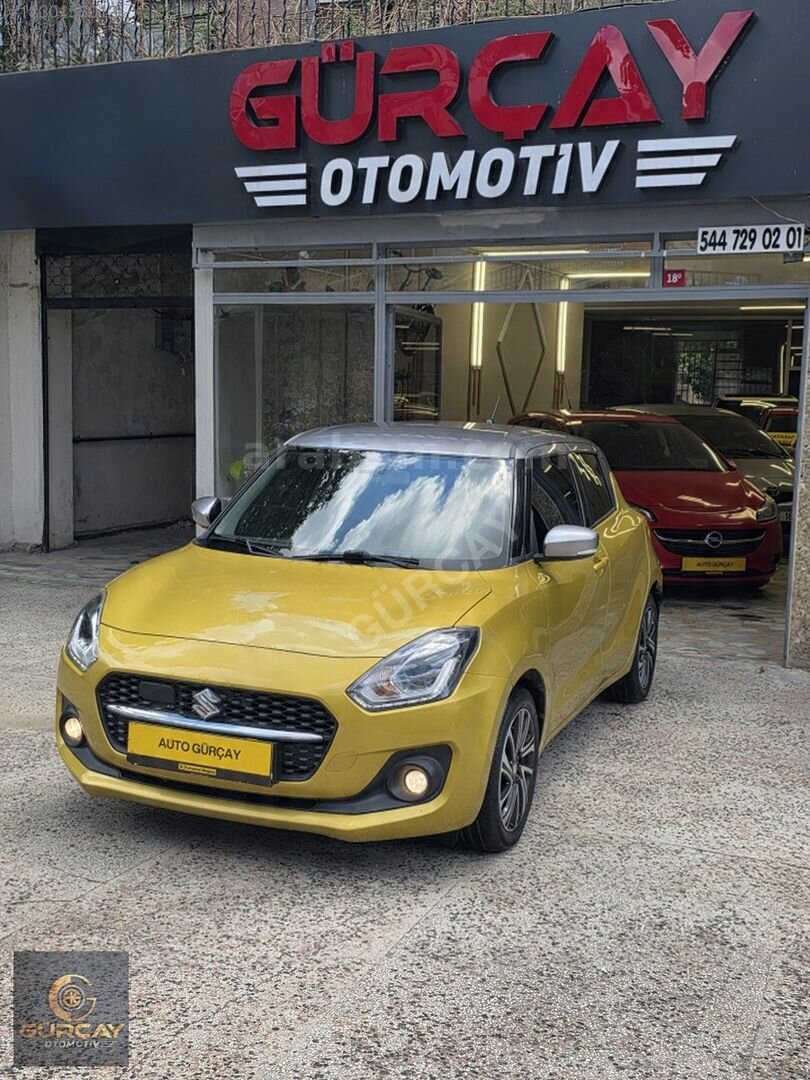 Galeriden Suzuki Swift 1.2 Hibrit GLX Premium 2021 Model İstanbul 68.950 km Sarı 2