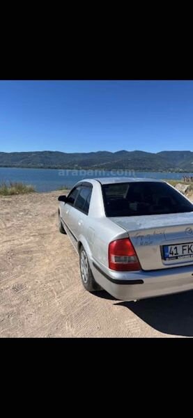 Sahibinden Mazda 323 1.5 1999 Model Kocaeli 370.000 km Gri (Gümüş)