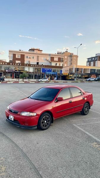 Sahibinden Mazda 323 1.8 Familia 1997 Model Antalya 400.000 km Kırmızı