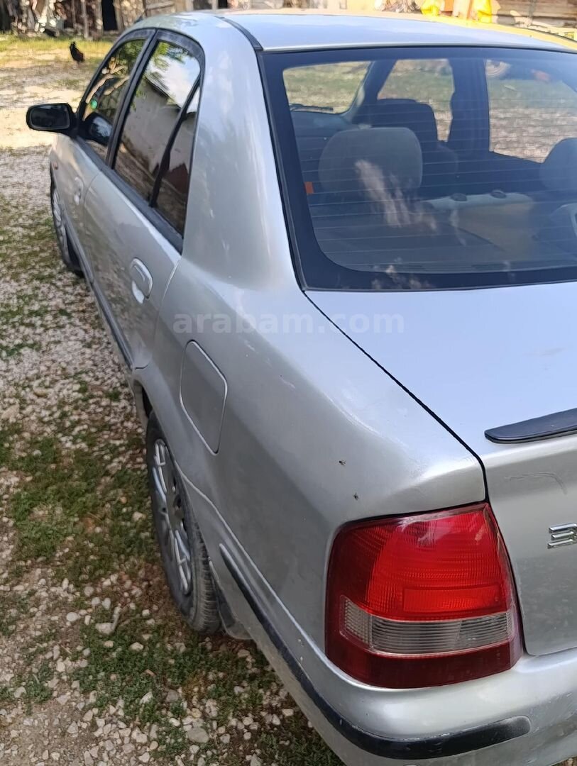 Sahibinden Mazda 323 1.5 Familia 1999 Model Ankara 320.000 km Gri (Gümüş) 4