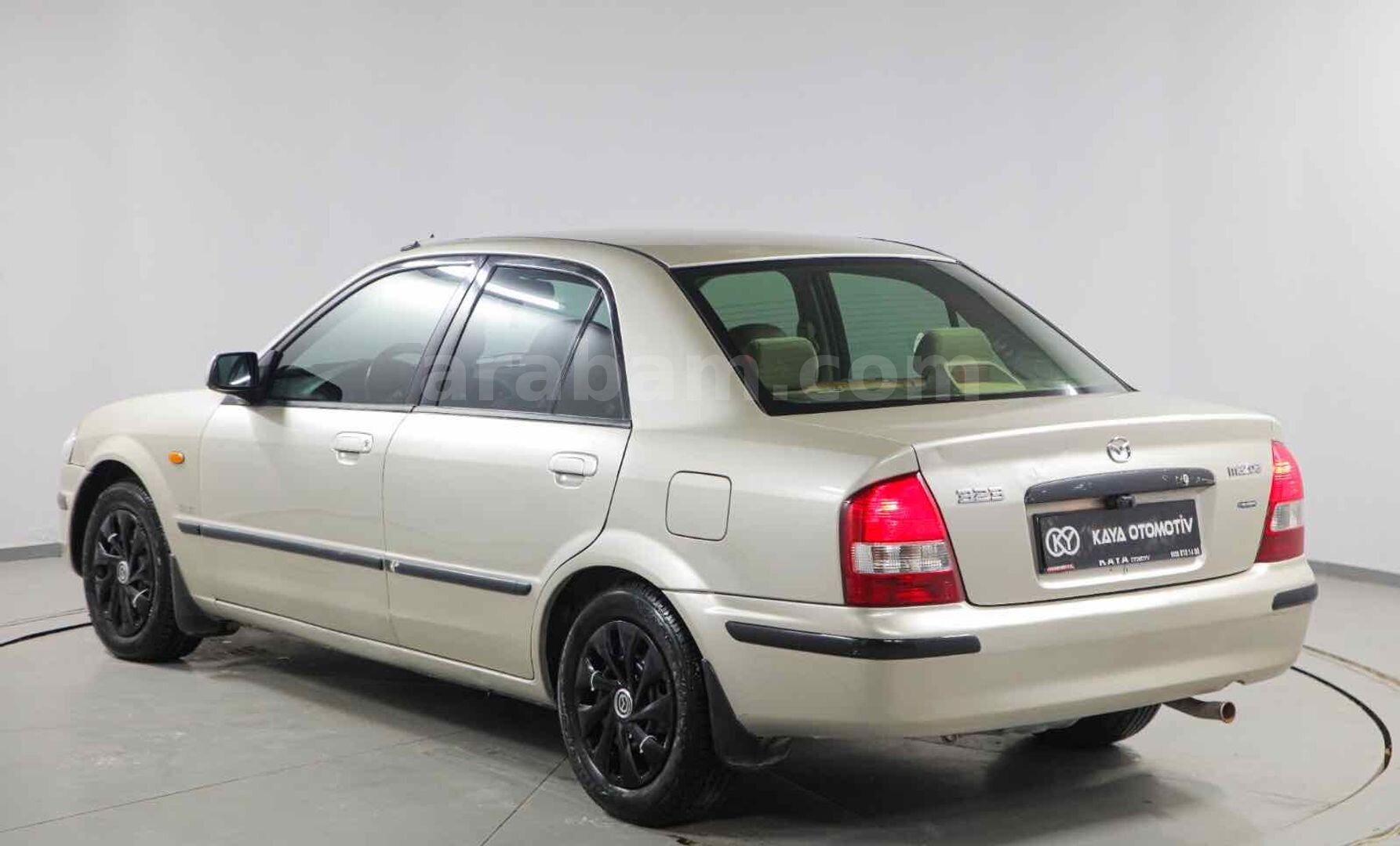 Galeriden Mazda 323 1.5 i 1999 Model Osmaniye 309.000 km Kahverengi 4