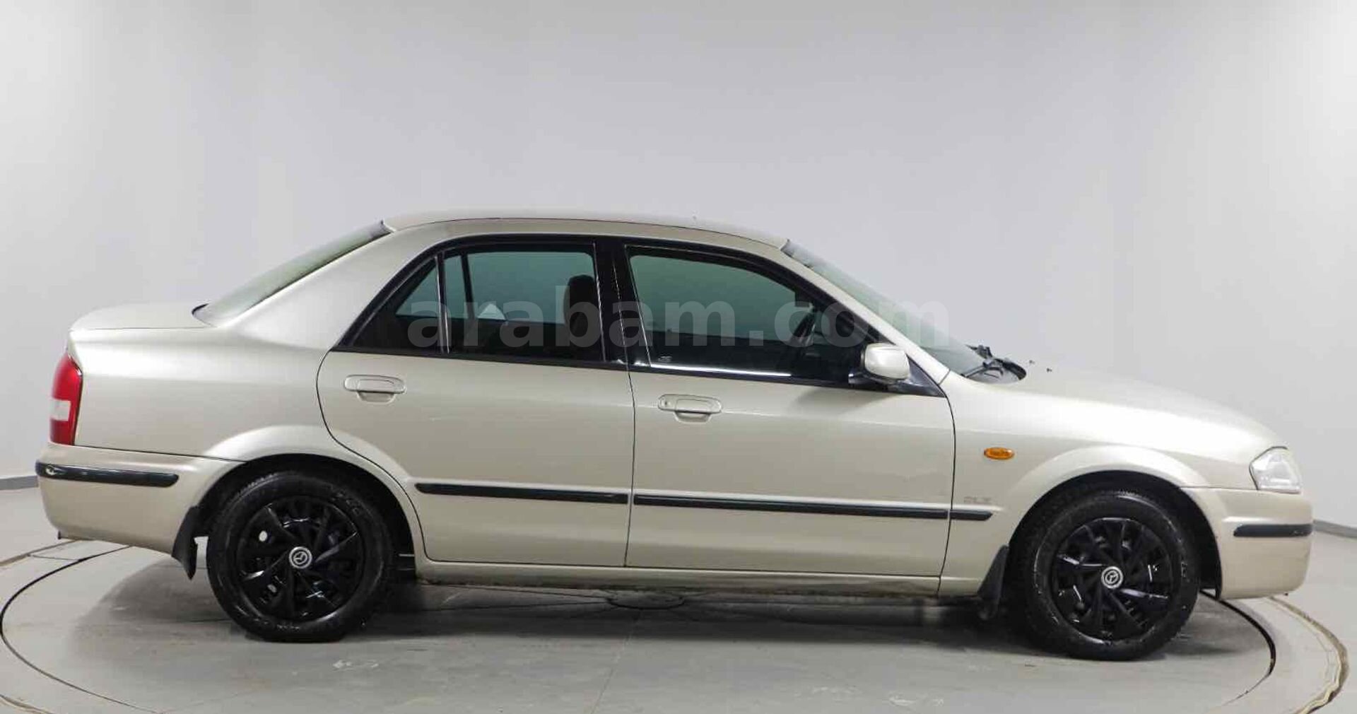 Galeriden Mazda 323 1.5 i 1999 Model Osmaniye 309.000 km Kahverengi 7